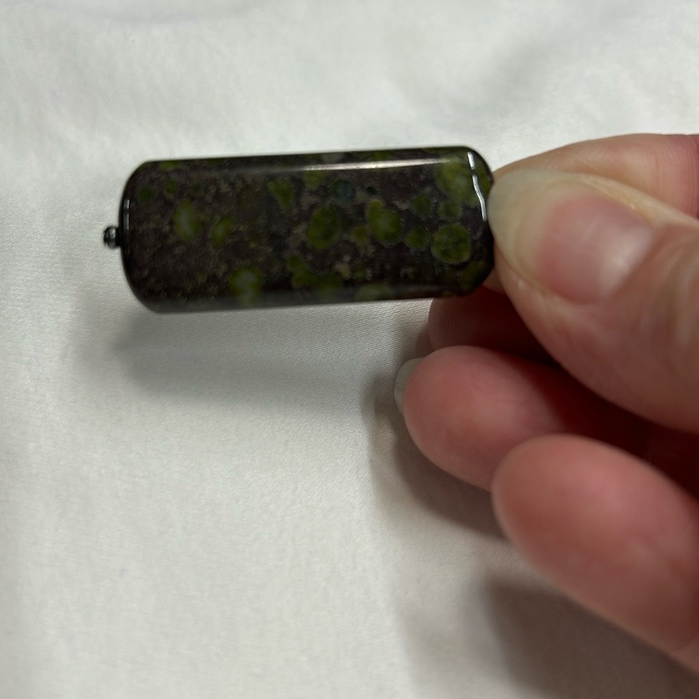 Polished stone pendant